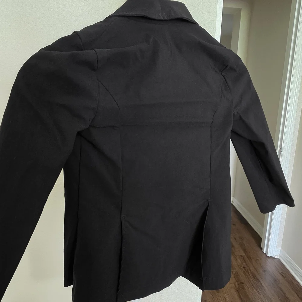 Weissman Black Jacket with Glittering Silver Tie